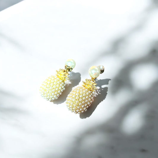 Aretes piña perlas blancas