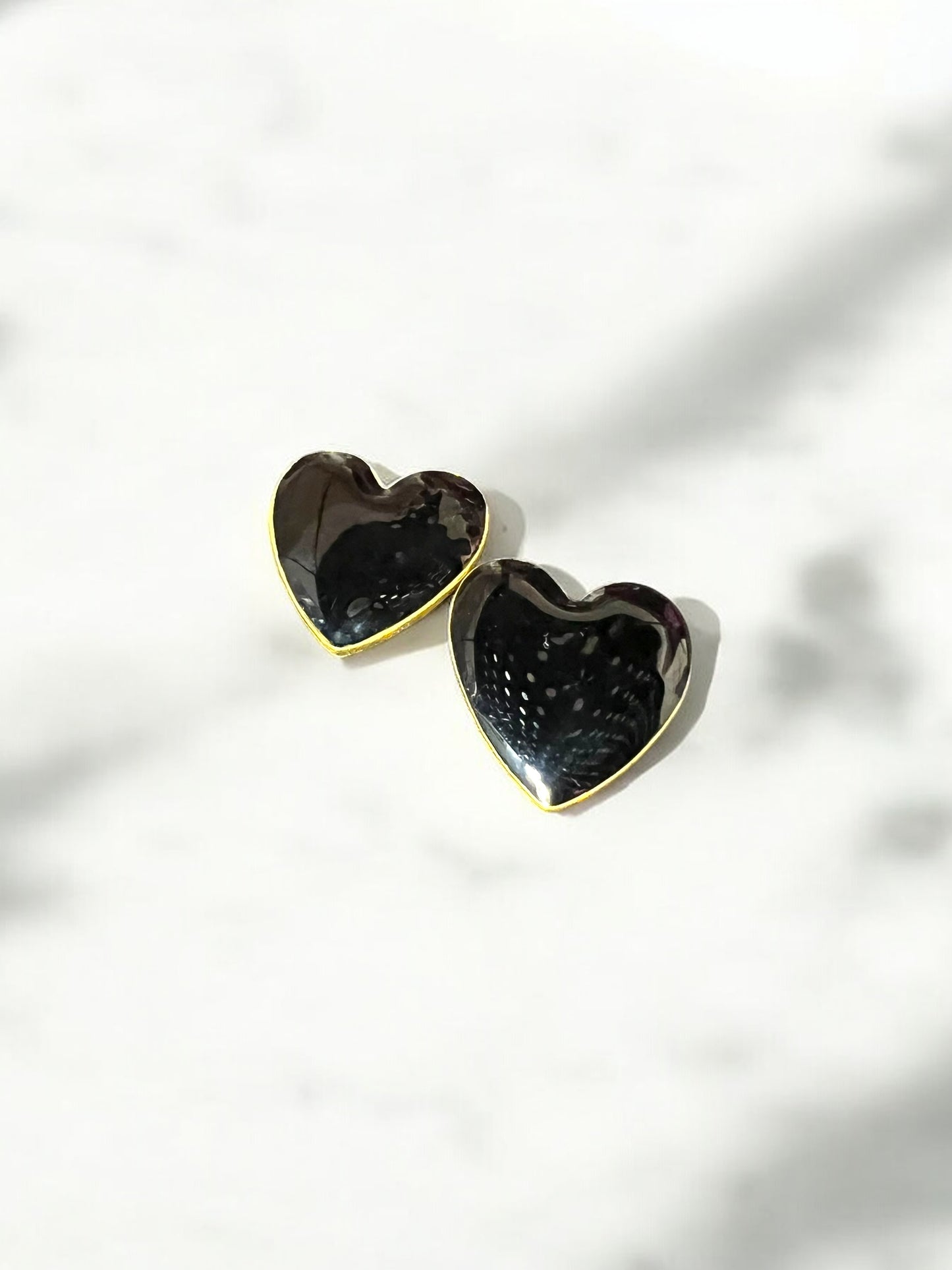 Aretes corazón negro