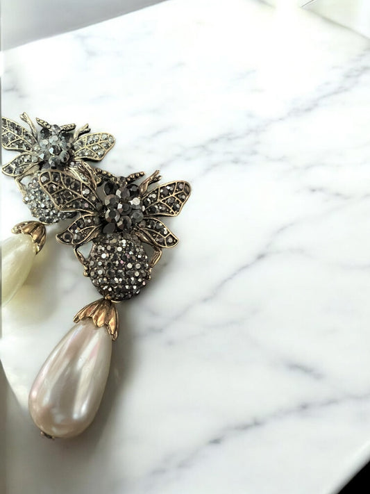 Aretes insectos largos