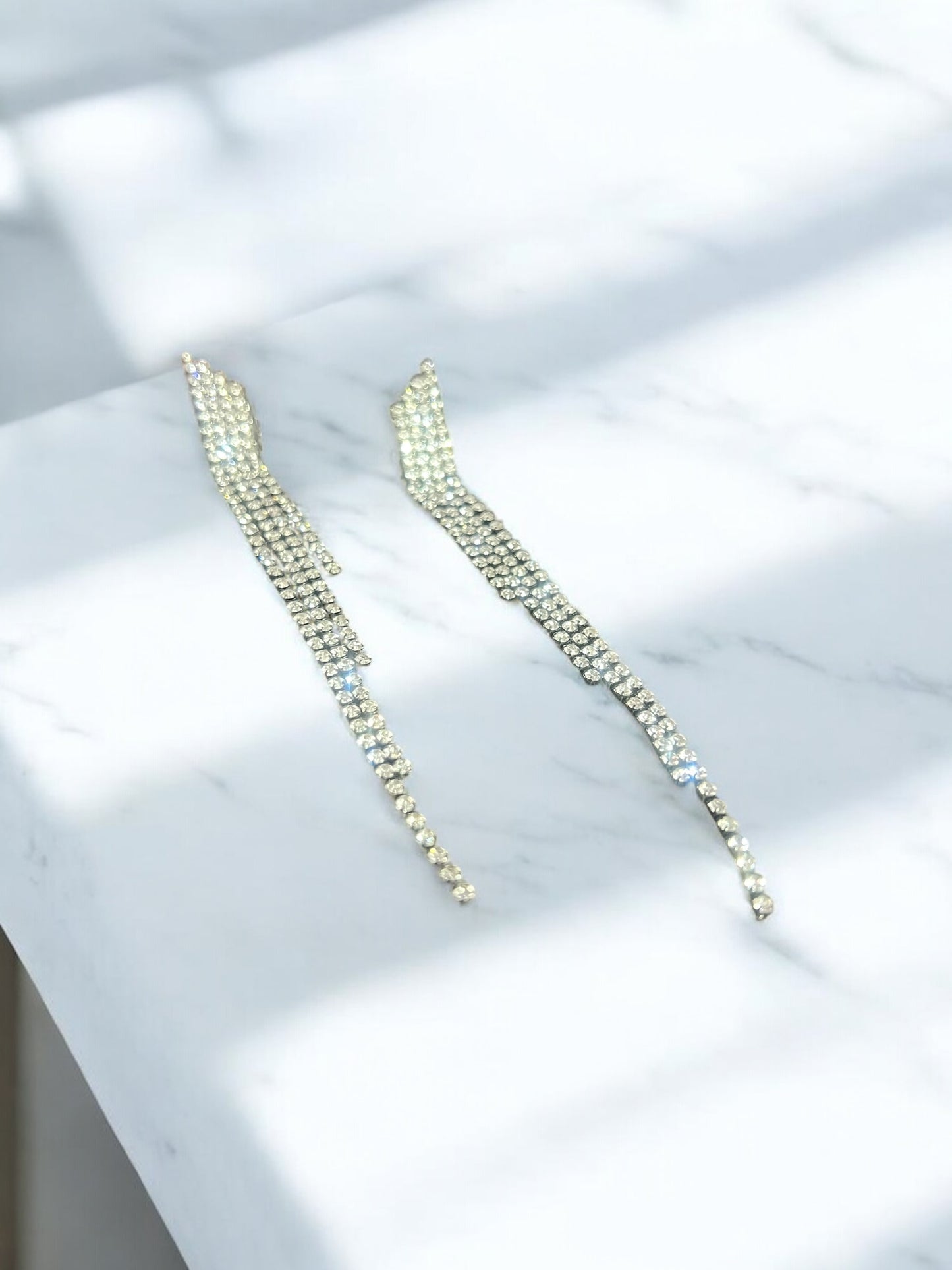Aretes largos brillos