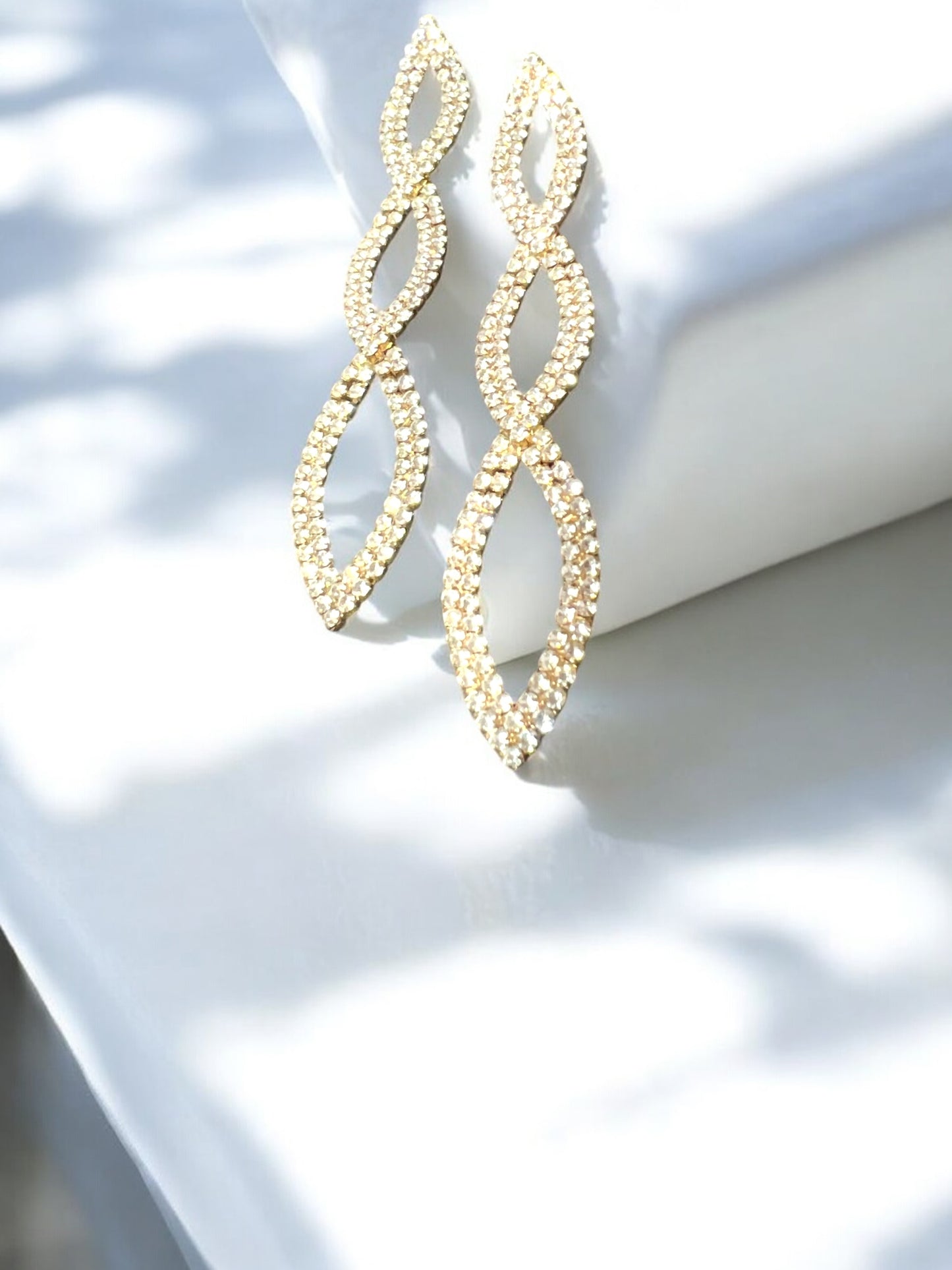 Aretes largos brillos